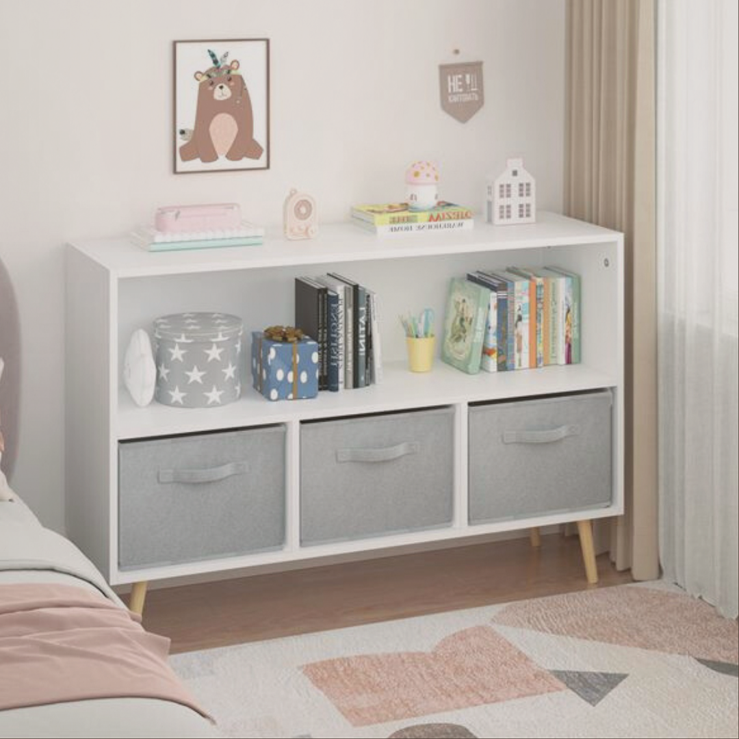 White storage unit with gray bins in a child's room