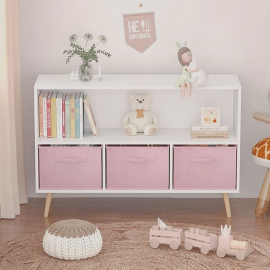 White storage unit with pink bins in a child's room
